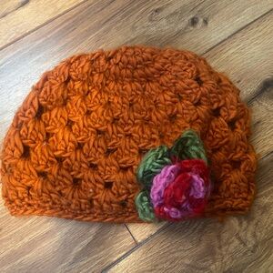 Handmade Orange Crochet Beanie with Floral Accent